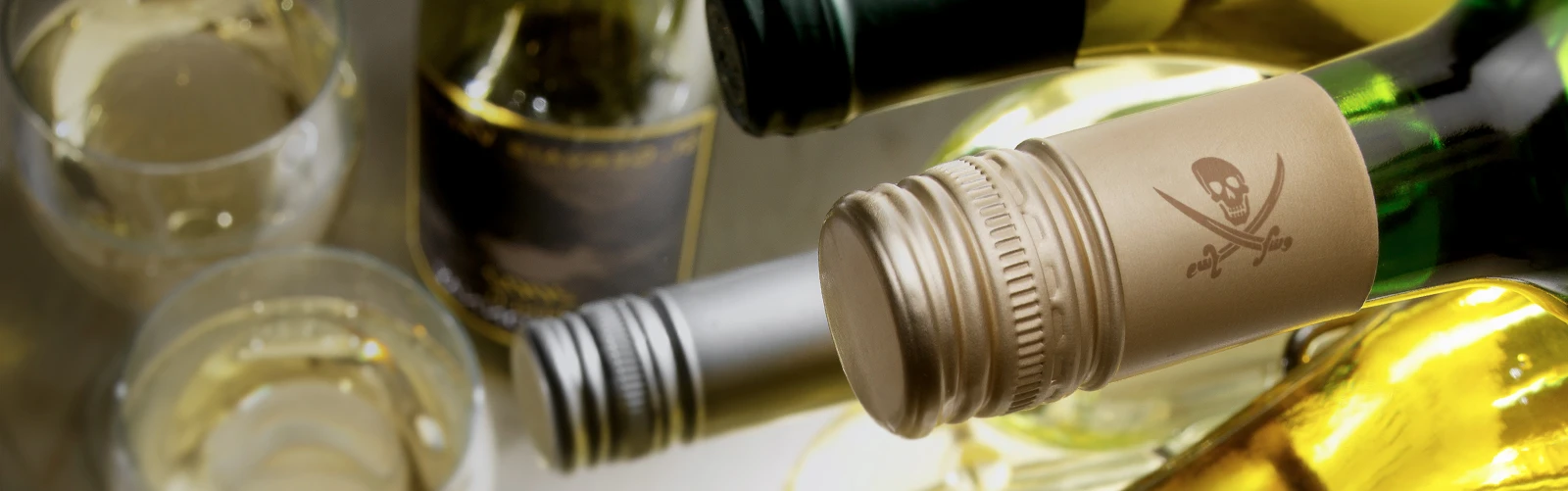 jolly roger on the side of a wine bottle cap