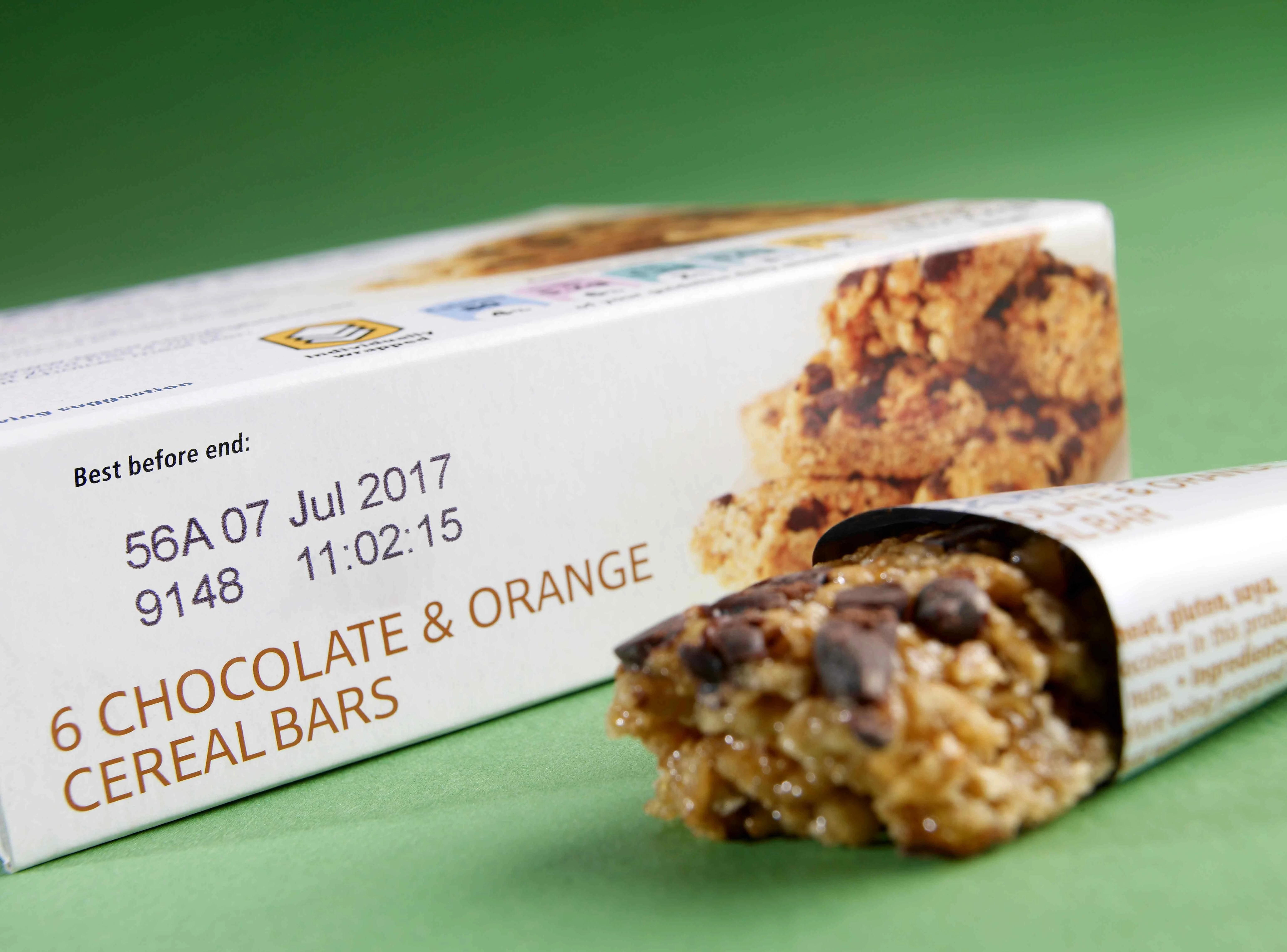 Black, 2-line thermal inkjet printer code on white cereal bar box
