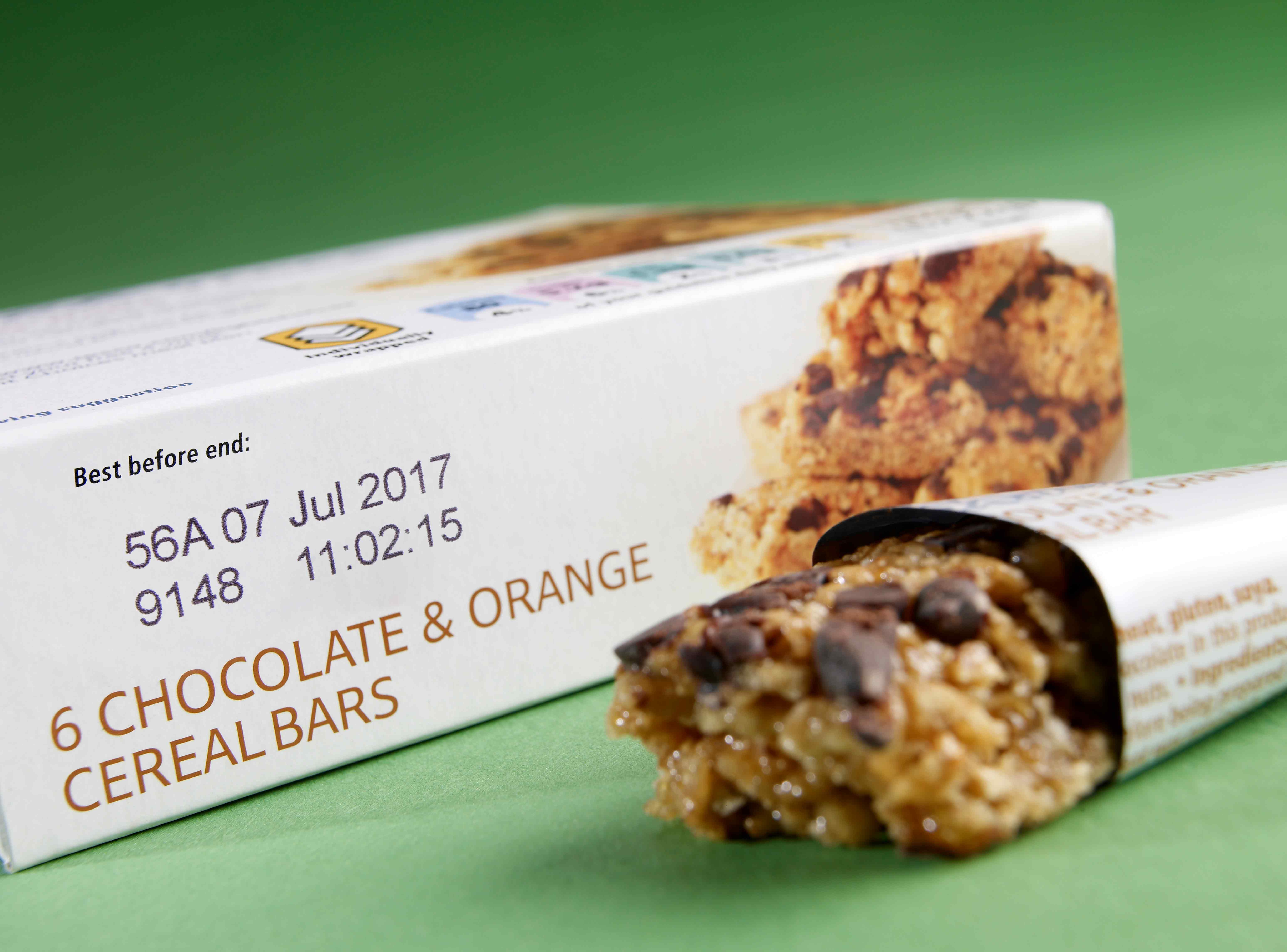 Black, 2-line thermal inkjet printer code on white cereal bar box