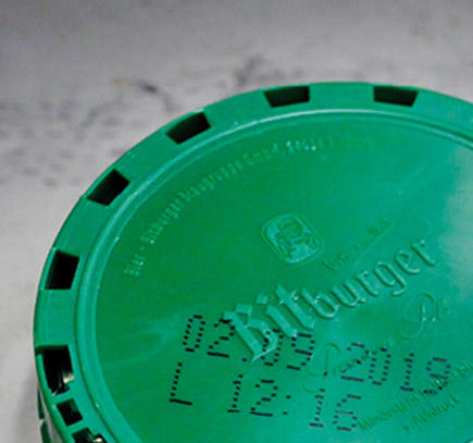 Tintenstrahldruck von KEG-Staubkappen