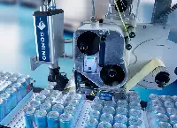 Mx350i-B Labeling on a tray of cans