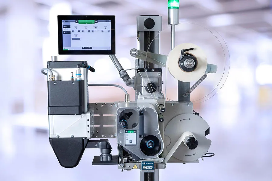 도미노 자동라벨부착기 Mx350i