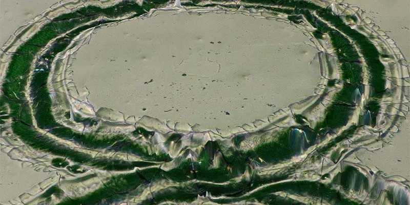 Microscopic image of laser code on a glass bottle