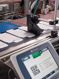 Impression Série Gx PRO sur des  étuis pharmaceutiques plats.