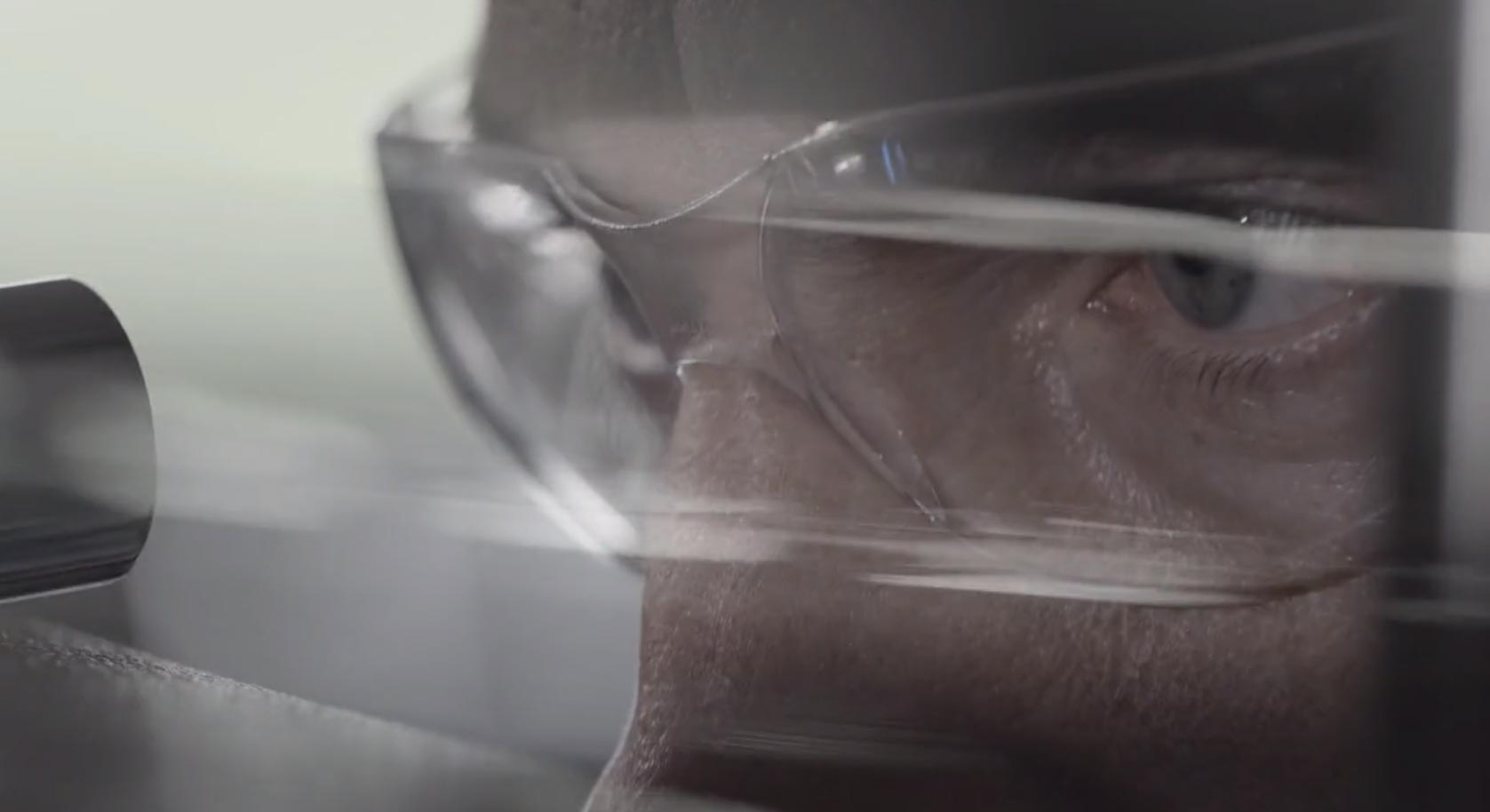 close up from bridge of nose to forehead of a persons face wearing eye protection spectacles 