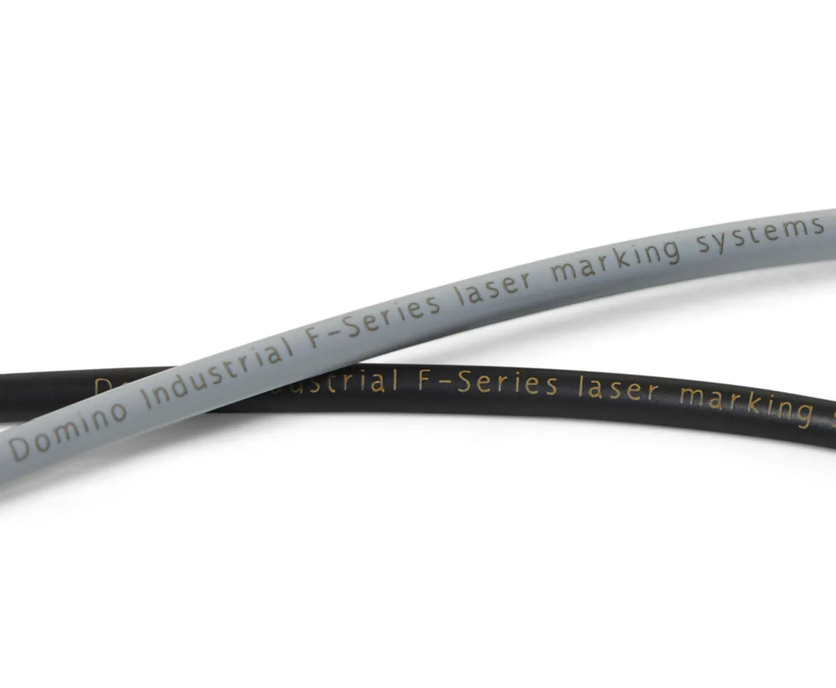 Domino Extrusion Laser Coding Station coding onto wires